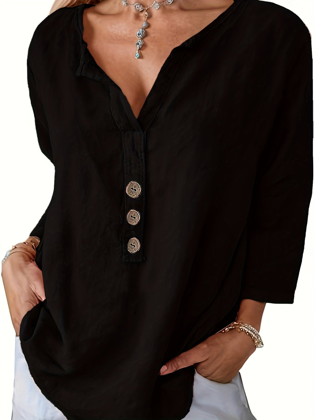 Blusa holgada de escote en V con botones