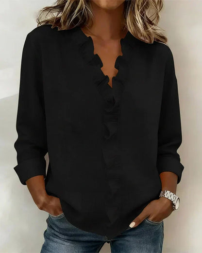 Blusa de lino con cuello en V
