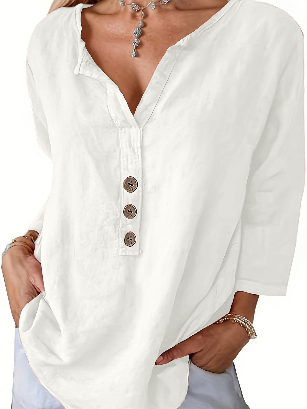 Blusa holgada de escote en V con botones
