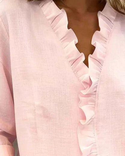 Blusa de lino con cuello en V