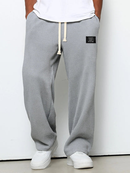 Pantalón de punto de pierna ancha con cintura ajustable