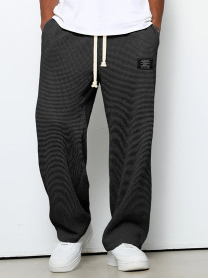 Pantalón de punto de pierna ancha con cintura ajustable