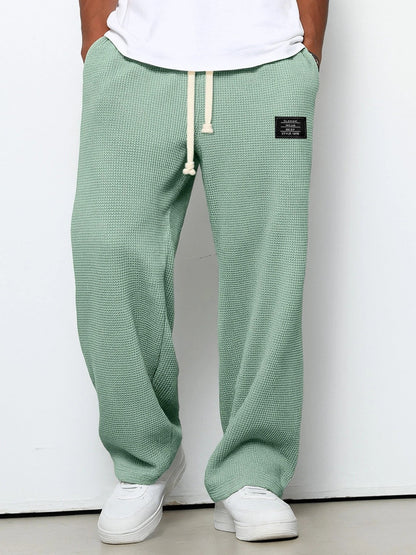 Pantalón de punto de pierna ancha con cintura ajustable