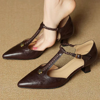 Zapatos destalonados de cuero con correa trenzada y tacón fino