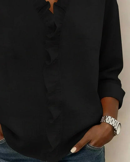 Blusa de lino con cuello en V