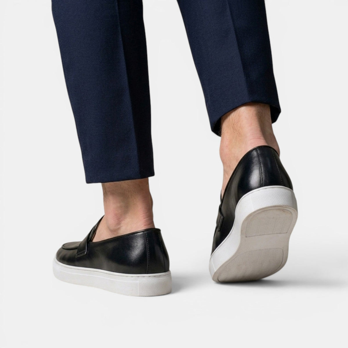 Mocasines penny loafer de cuero con suela chunky blanca