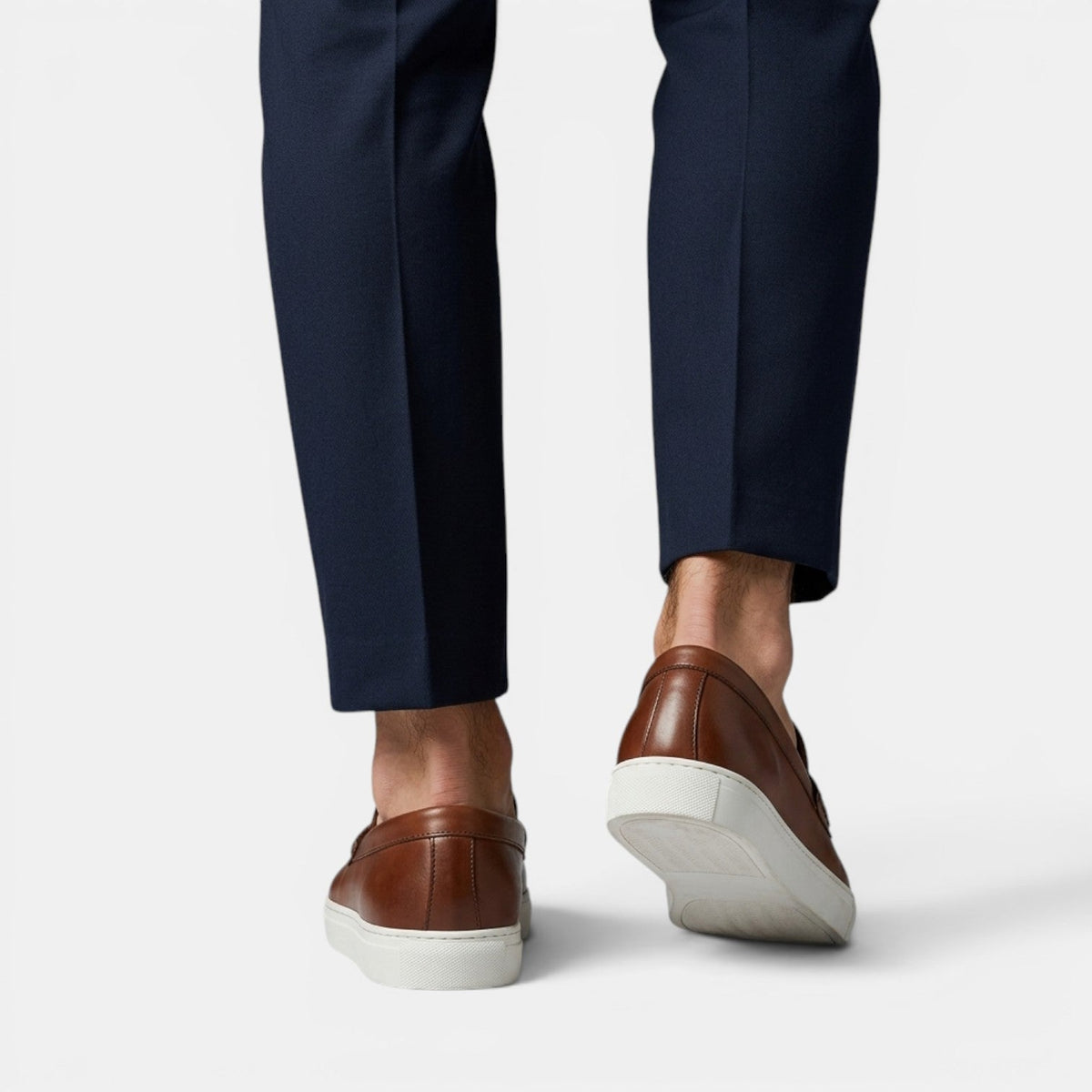 Mocasines penny loafer de cuero con suela chunky blanca